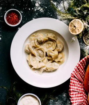 Dumplings with lemon and pepper Stock Photos
