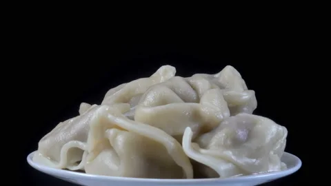 Dumplings on a plate in 4K Stock Footage 138276022