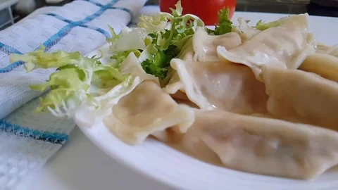 Dumplings on a plate Video stock 89711119