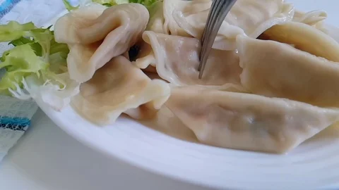 Dumplings on a plate Stock Footage 89711140
