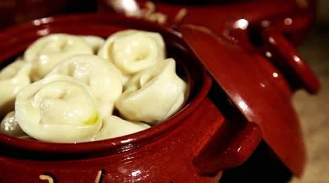  Dumplings in a pot with oil Video stock 64751433