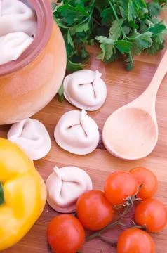 Dumplings in pot Stock Photos