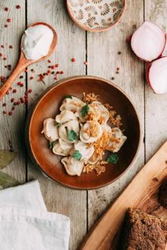 Dumplings with potatoes, cheese, berries Stock Photos
