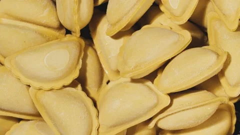 Dumplings on a spinning plate, close-up. Stock Footage 144907169