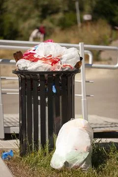 Dumpster being full with garbage Stock Photos