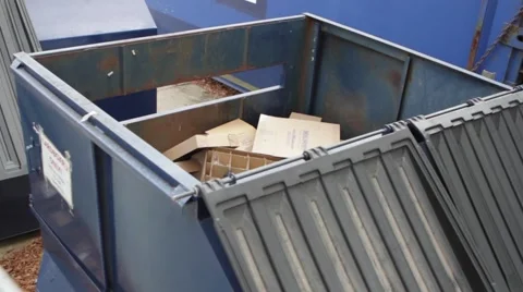 Dumpster With Cardboard Stock Footage 66763114