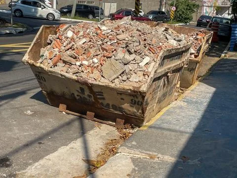 Dumpster with construction debris Stock Photos