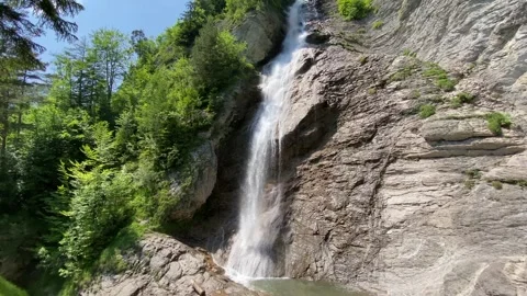 Dundelbachfall I or upper waterfall on the Dundelbach stream - Switzerland Stock Footage 295448095