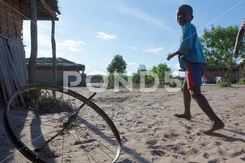 DUNDO/ANGOLA - 23 APRIL 2015 - African rural child with his traditional toy. Stock Photos