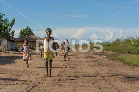 DUNDO/ANGOLA - 23 APRIL 2015 - African rural children with his traditional to Stock Photos