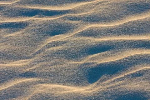 Dune on beach at sunset Stock Photos