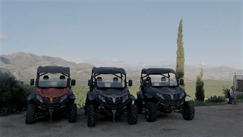Dune buggies with Mount Srd mountains backdrop, Dubrovnik, Croatia, 4k Stock-Footage 274456843
