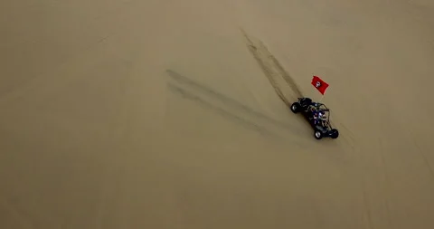 Dune Buggy With Flag Driving From top Right of Frame in Zion National Park 動画素材 247323937