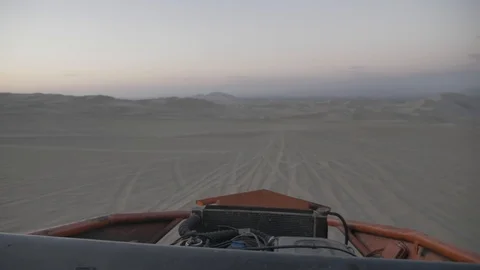 Dune buggy running on the immense sand dune of Huacachina, Ica, Peru. Stock Footage 125272336