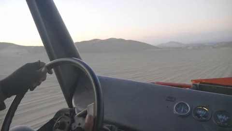 Dune buggy running on the immense sand dune of Huacachina, Ica, Peru. Stock Footage 125273673