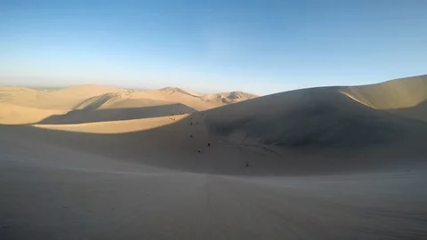 Dune buggy running on the immense sand dune of Huacachina, Ica, Peru. Stock Footage 125274018