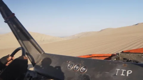 Dune buggy running on the immense sand dune of Huacachina, Ica, Peru. Stock Footage 125274291