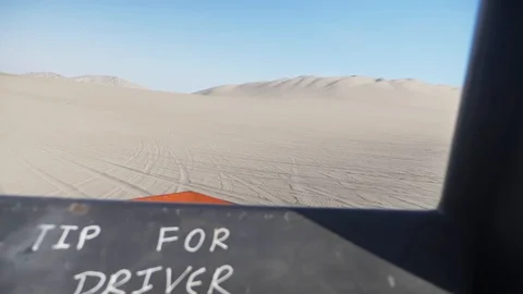 Dune buggy running on the immense sand dune of Huacachina, Ica, Peru. Stock Footage 125274349