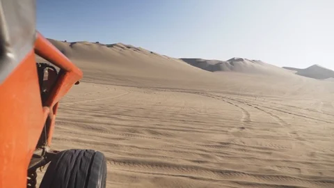 Dune buggy running on the immense sand dune of Huacachina, Ica, Peru. Stock Footage 125274364