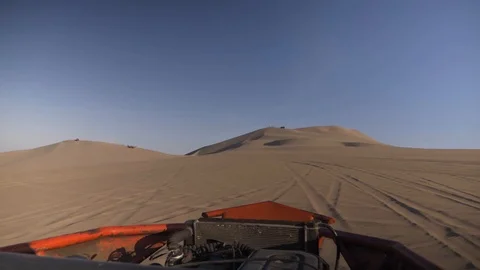 Dune buggy running on the immense sand dune of Huacachina, Ica, Peru. Stock Footage 125274507