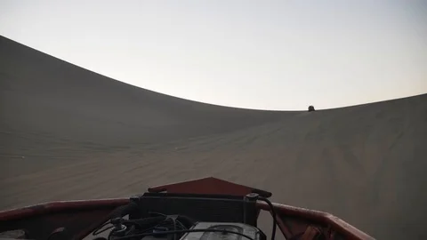 Dune buggy running on the immense sand dune of Huacachina, Ica, Peru. Stock Footage 125274526