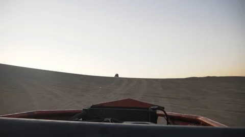 Dune buggy running on the immense sand dune of Huacachina, Ica, Peru. Stock Footage 125274539