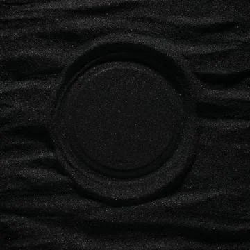 Dunes of dark black sand with empty center space of smooth volcanic sand fo.. Stock Photos