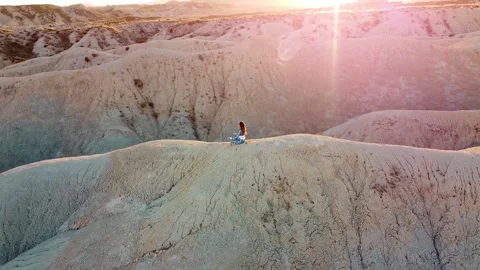 Dunes desert landscape drone point of view of woman on vacations at sunset Stock Footage 158542408