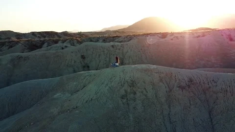 Dunes desert landscape drone point of view of woman on vacations at sunset Video stock 158542447