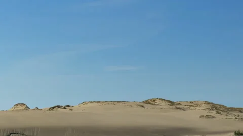 Dunes of Kursk Spit seen from a ship Stock Footage 310445757