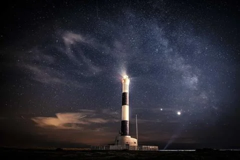 Dungeness Lighthouse at night Stock Photos
