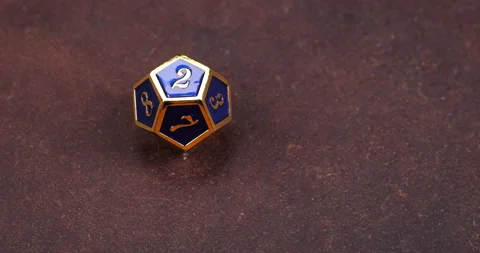 Dungeons and Dragons Dice Roll D12 12 Sided Blue Metal Die Rolling 2 Slow Motion Stock Footage