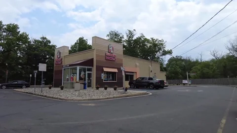 Dunkin Donuts coffee store and restaurant Stock Footage 247232589