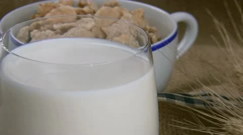 Dunking biscuit in the milk Stockbeeldmateriaal 12745138