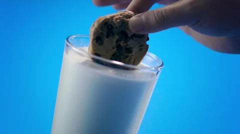Dunking A Cookie in Milk Stock Footage 63626577