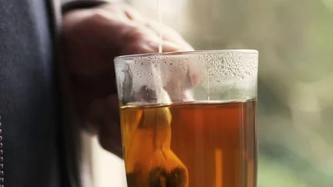 Dunking a sage tea bag Video stock 70959147