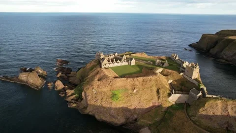 Dunnottar Castle - situated on a cliff (old castle on the coast) Stock Footage 225429725