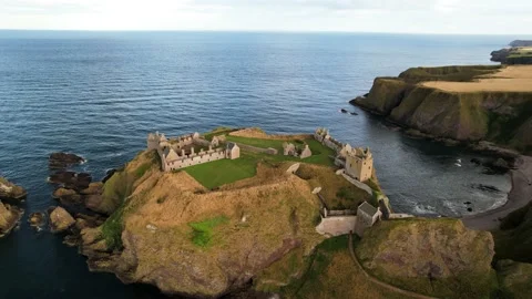 Dunnottar Castle - situated on a cliff (old castle on the coast) Stock Footage 225429759