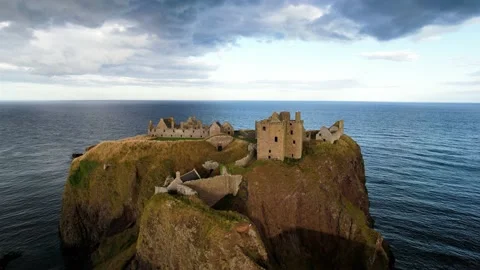 Dunnottar Castle - situated on a cliff (old castle on the coast) Stock Footage 225429849