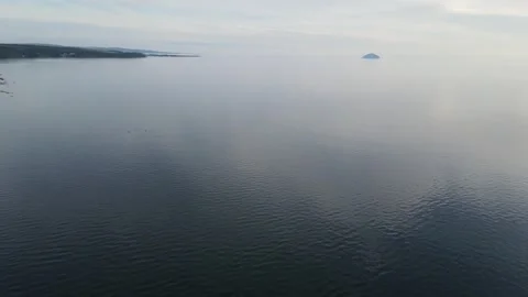 Dunure tracking orbit from sea Stock Footage 337413228