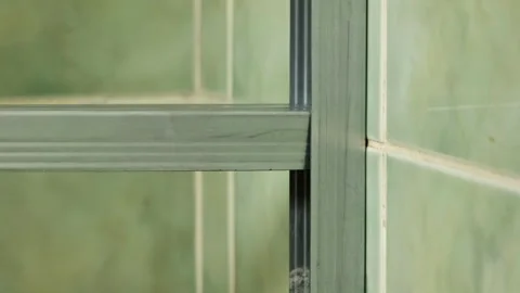 Durable metal construction from planks for shower enclosure Stock Footage 304406830