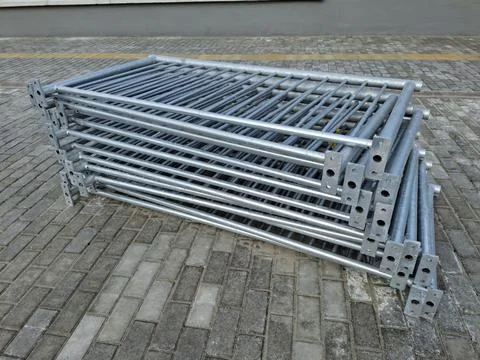 Durable protective fencing structures. Metal frameworks for fence Fotos de archivo