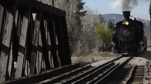 Durango and Silverton steam train crosses bridge, toward camera Stock Footage 166250276