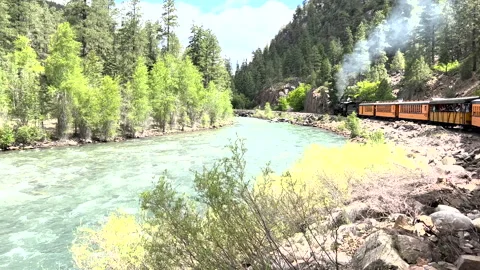 Durango to Silverton Colorado train along river with smoke Видео 211791708