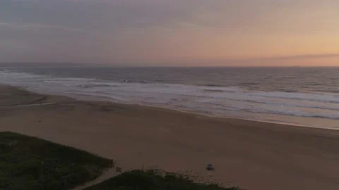 Durban beach at sunrise pullback Pigeons Stock Footage 140839611