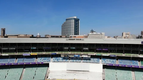 Durban Drone Pull back shot from Sahara Stadium Video stock 128587393