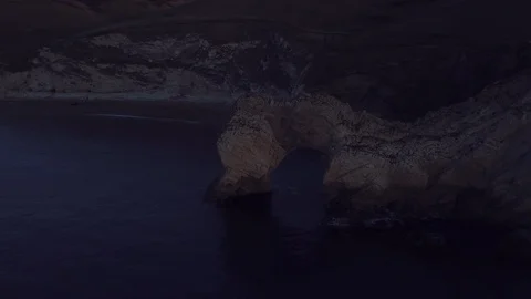 Durdle Door at Dawn Drone Video stock 100770314