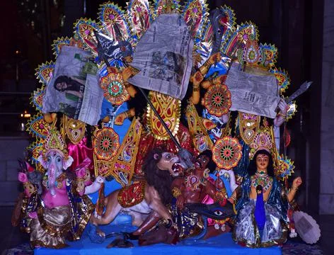 Durga idol face covered during shasti pooja Stock Photos