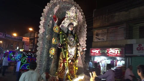 Durga Idol procession on road Stock Footage 98768071