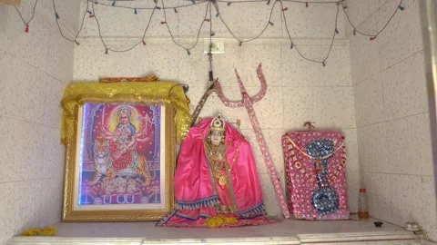 Durga Shrine with Statue and Trident Stock Footage 324910756